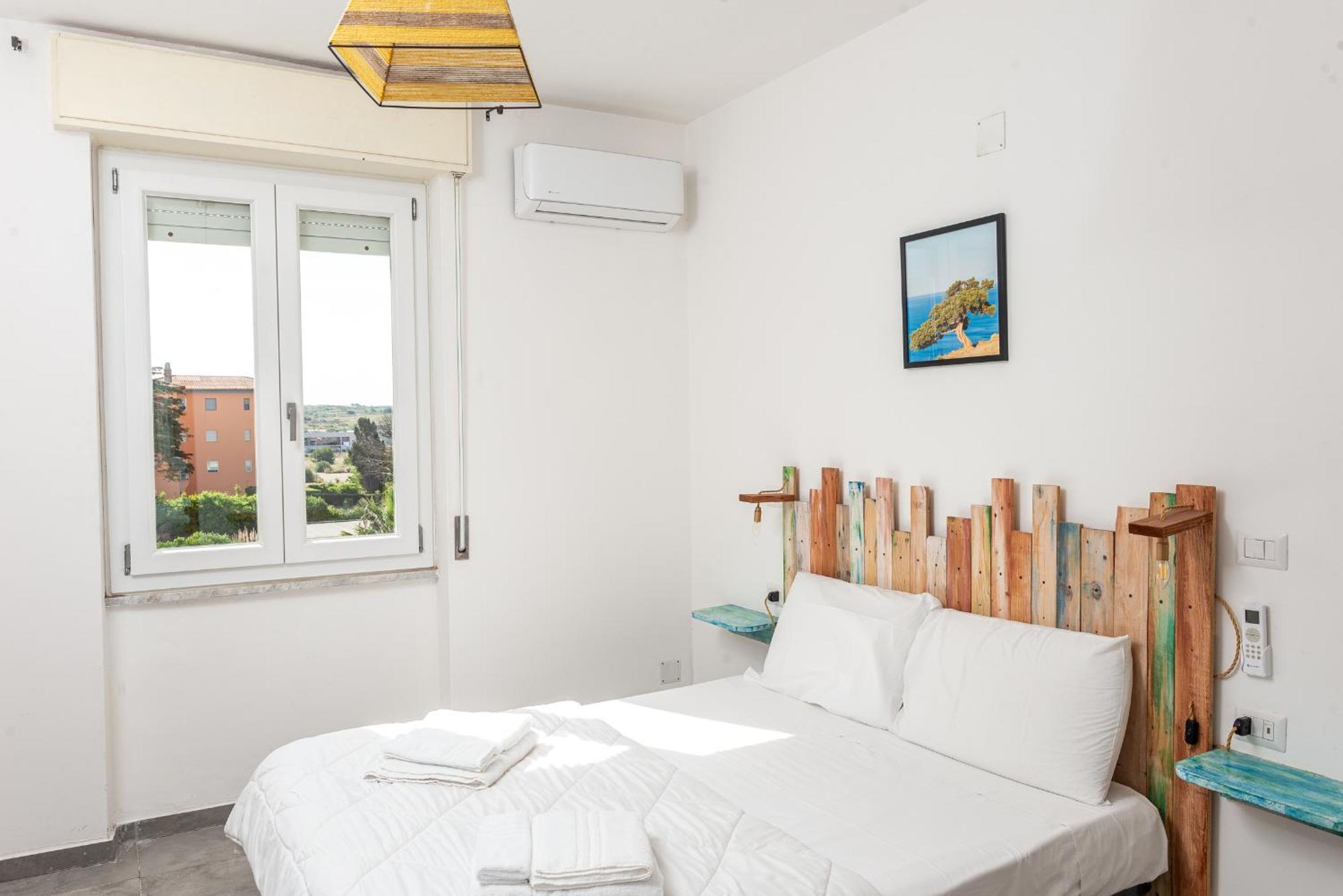 Guest House - Affittacamere Green Apartment - By Faendho Porto Torres Exteriör bild
