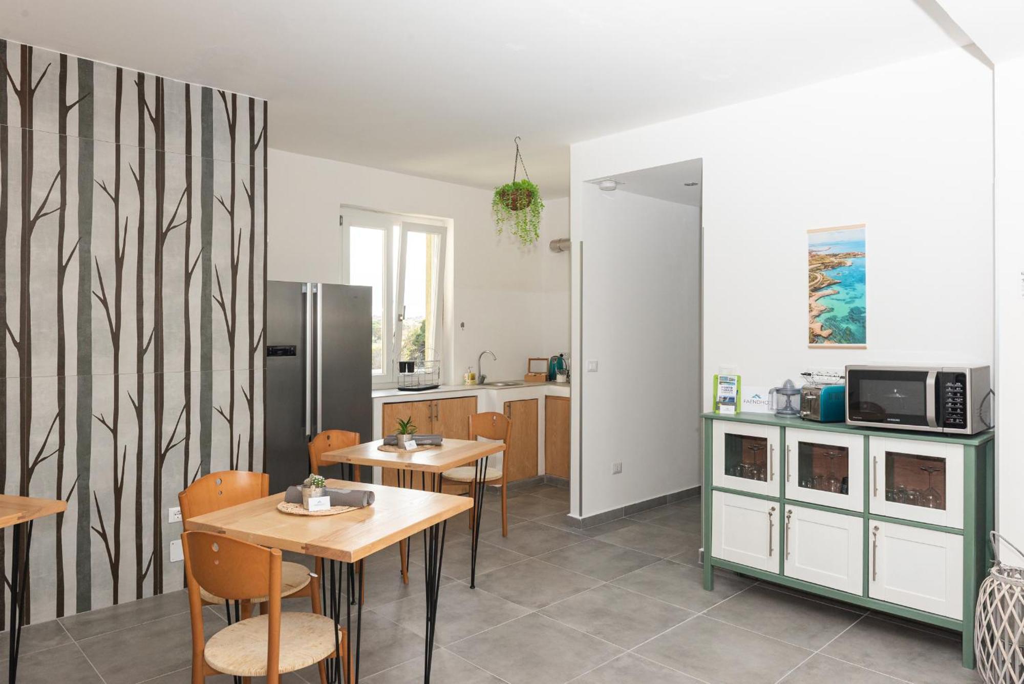 Guest House - Affittacamere Green Apartment - By Faendho Porto Torres Exteriör bild