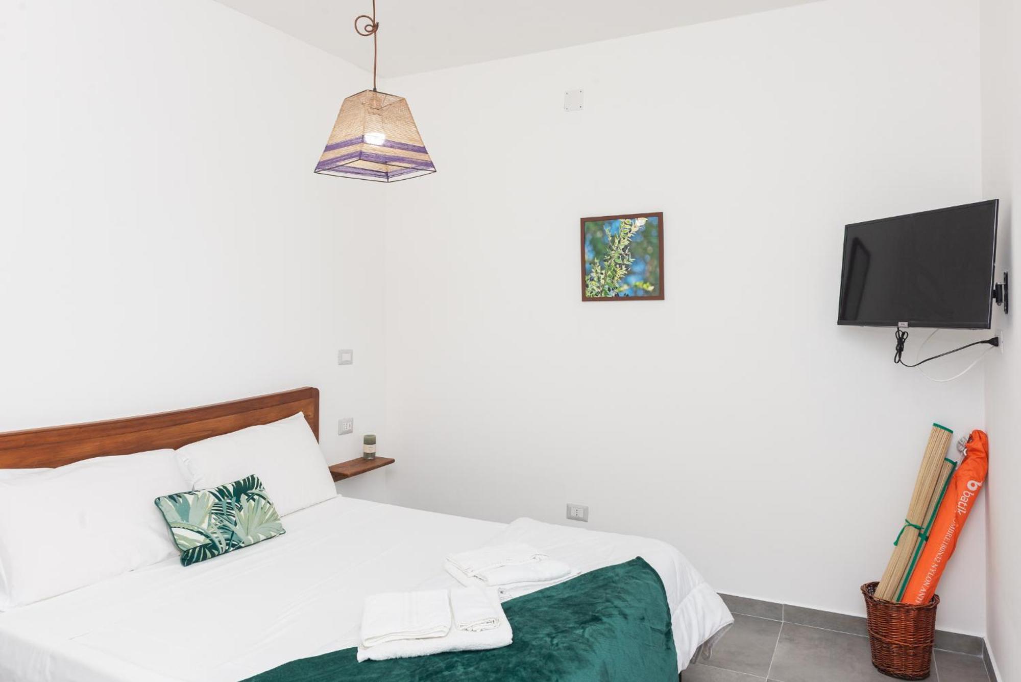 Guest House - Affittacamere Green Apartment - By Faendho Porto Torres Exteriör bild